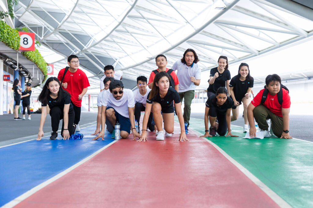 Corporate Amazing Race team building event in Singapore with teams competing at checkpoints