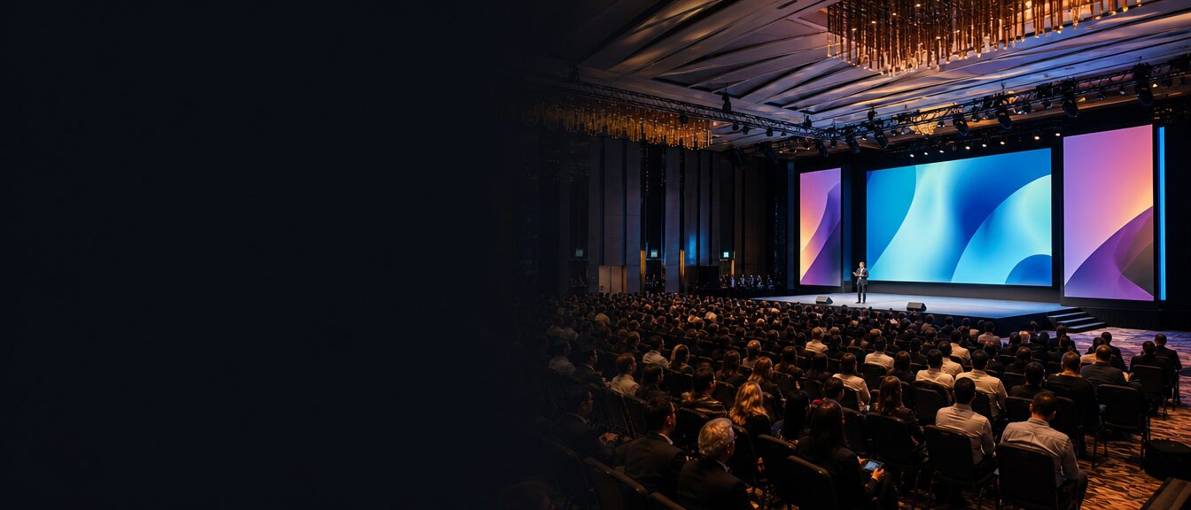 Corporate audience attending a keynote in a Singapore conference ballroom