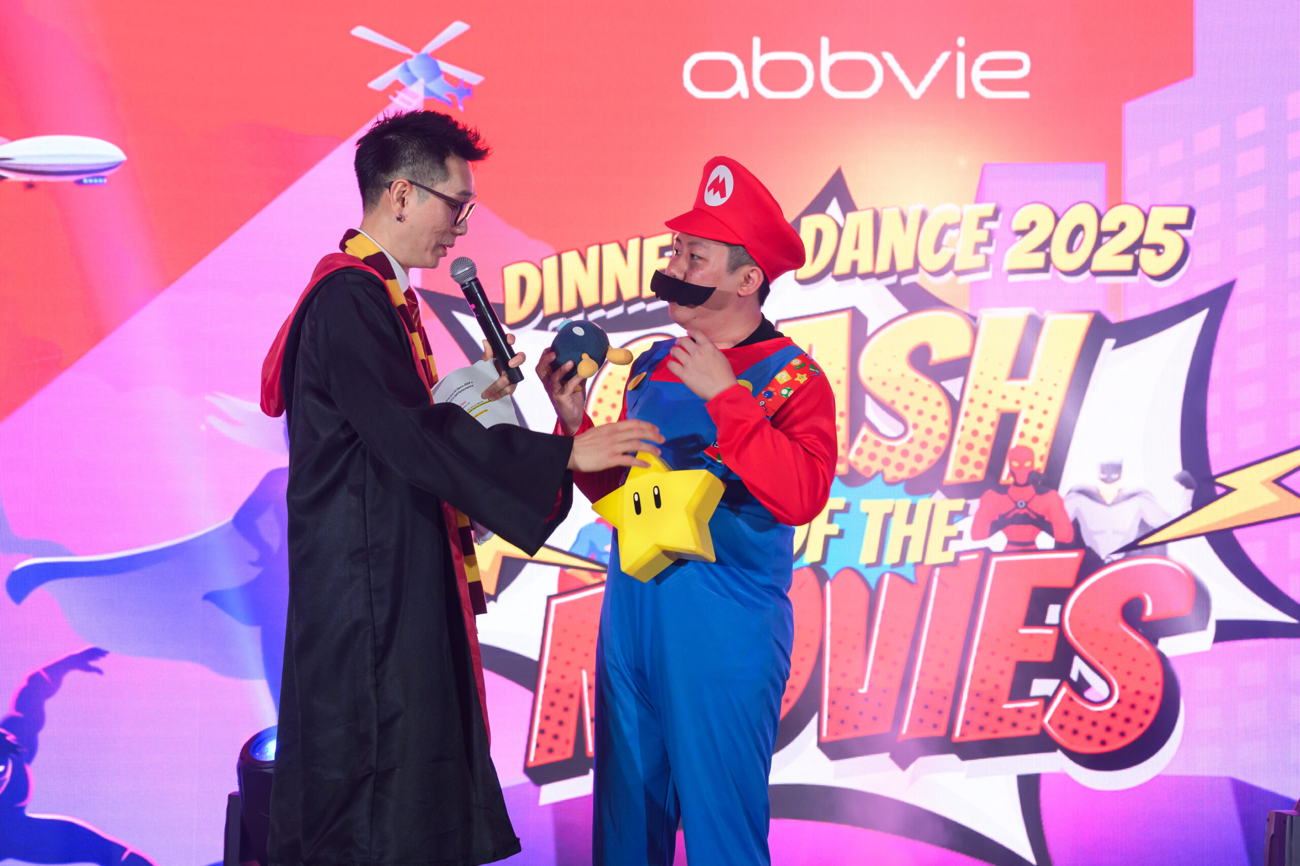 Corporate dinner and dance entertainment in Singapore with themed costumed performers on stage