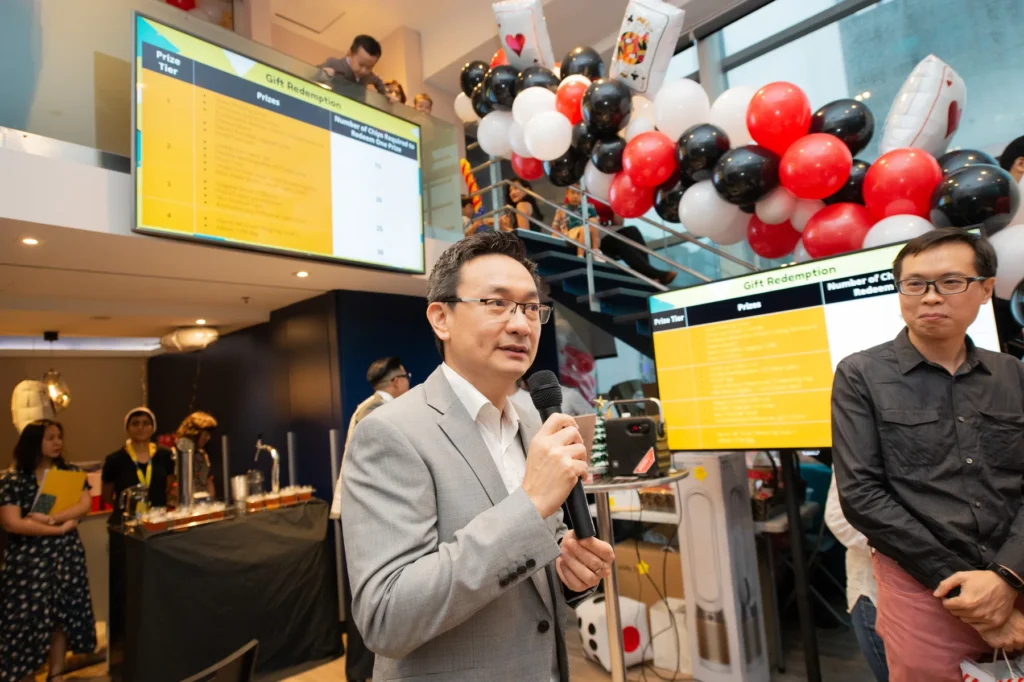 Corporate Christmas party host, event screens and festive balloon installation